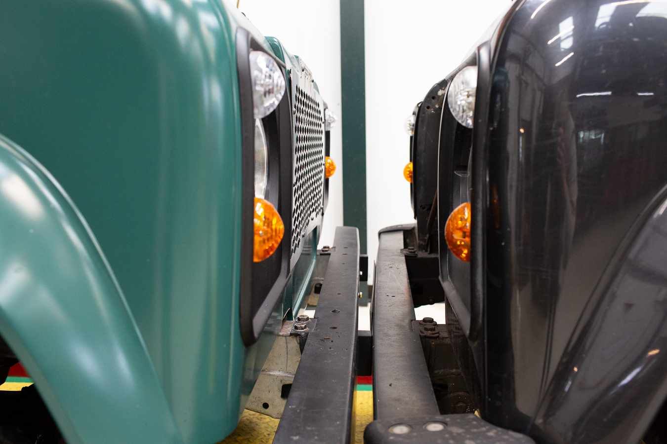 Close up of two Land Rover Defenders face to face